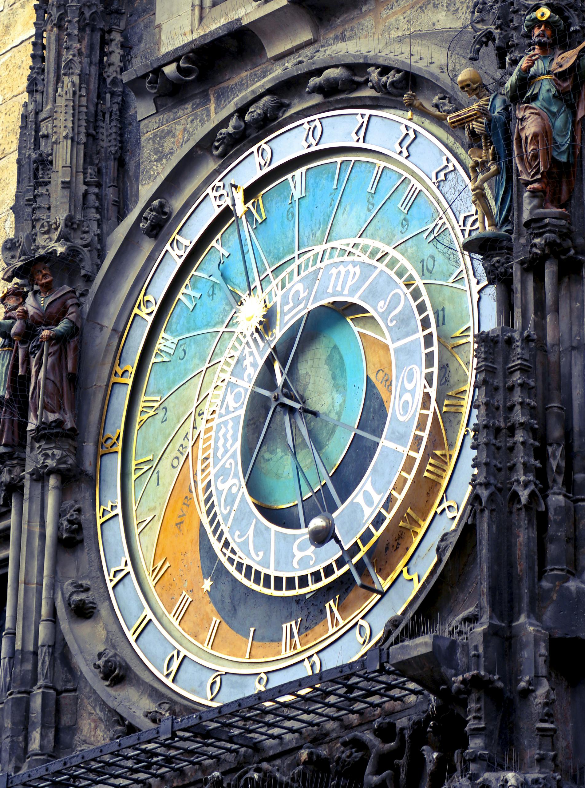 Close-up of Prague's historic astronomical clock featuring intricate details and vibrant colors.